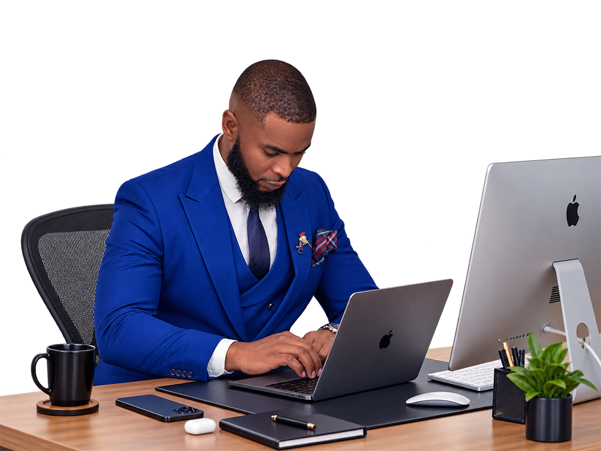 Ebuka Solomon working at his desk